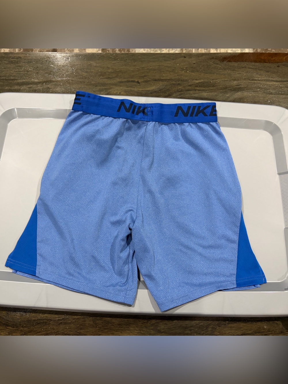 Nike Men’s Sky Blue Athletic Shorts with Dark Blue Accents